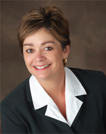 Headshot of Diane Nettifee, President and Founder of Magis